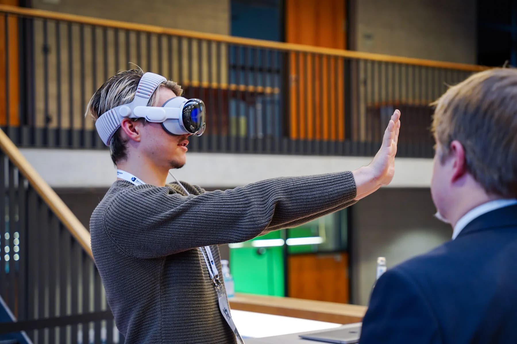 Visitor controlling an XR application with hand gestures