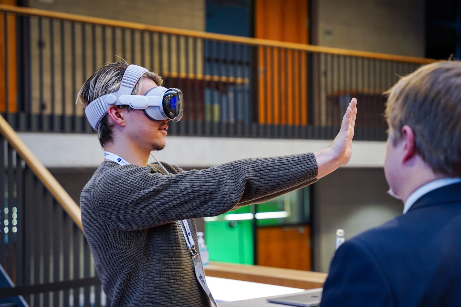 Visitor controlling an XR application with hand gestures